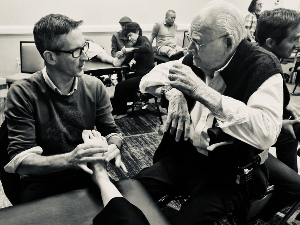 Matthew Stewart training with Dr Rue Tikker DPM in foot manipulation therapy FMT